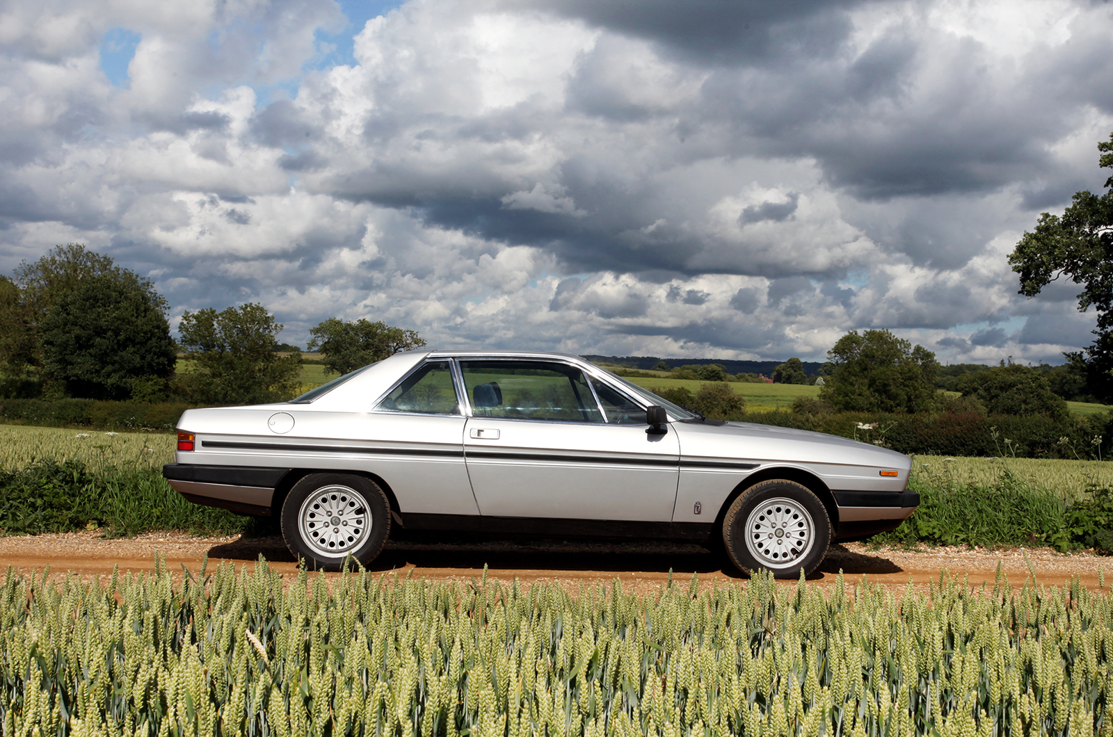 Classic & Sports Car – Luxury coupés: Mercedes 230CE vs Lotus Elite vs Lancia Gamma