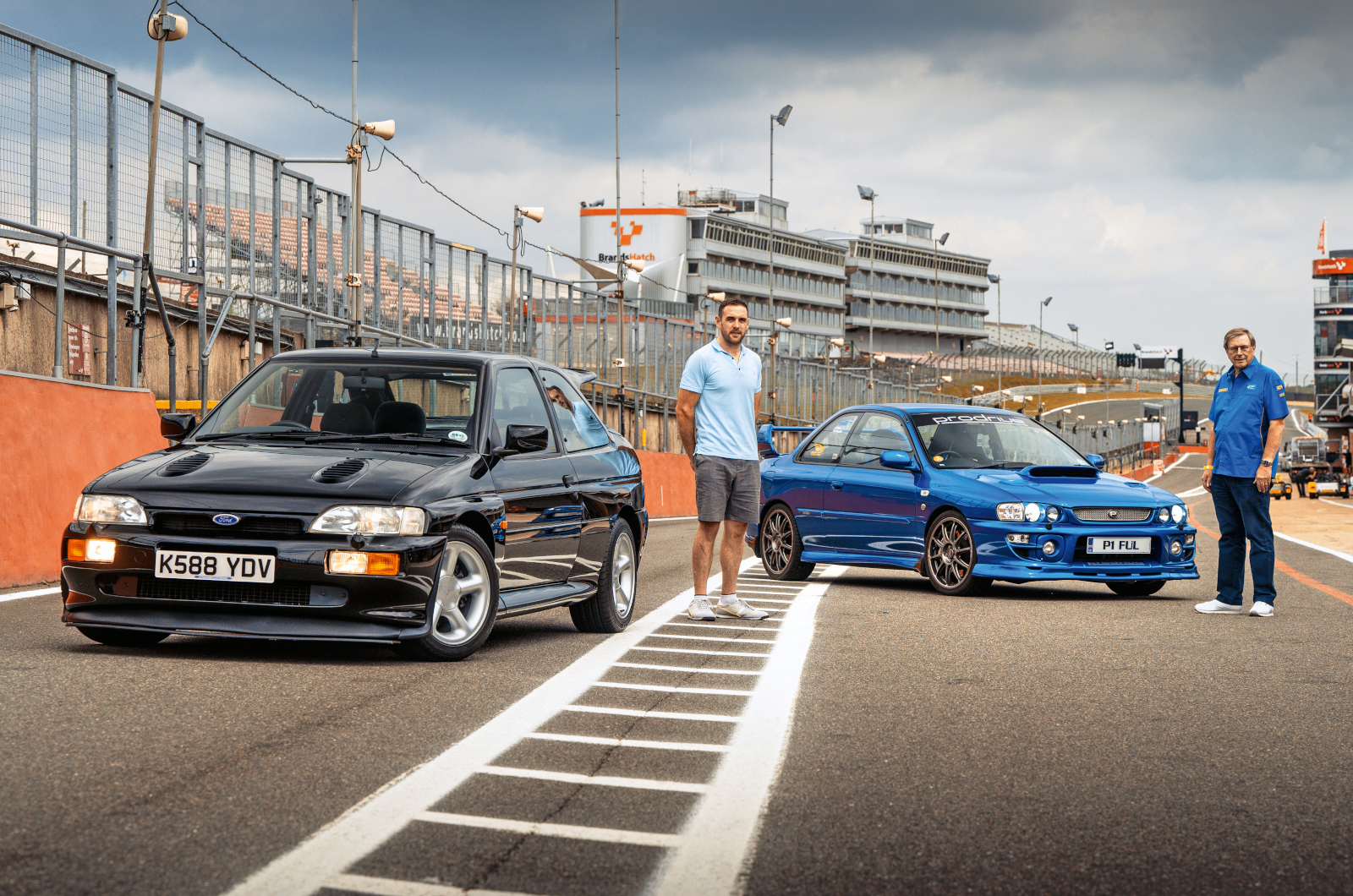 Classic & Sports Car - Black & Blue: Ford Escort RS Cosworth vs Subaru Impreza P1