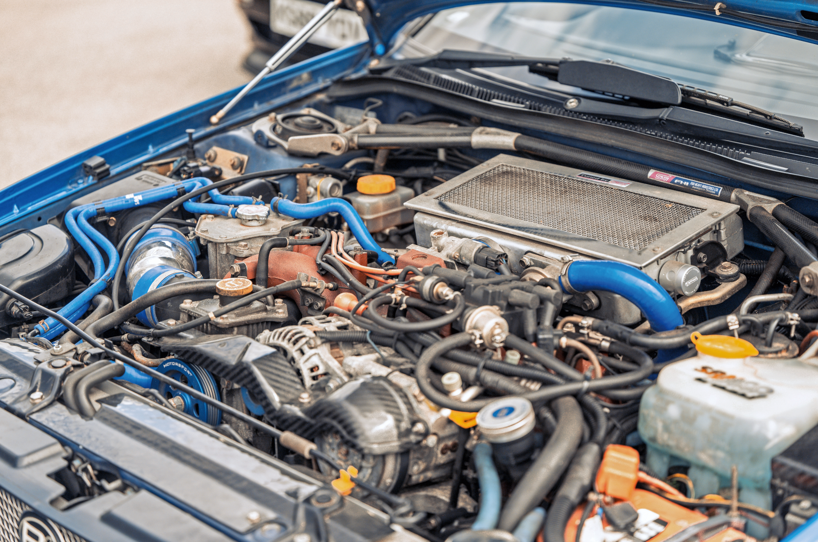 Classic & Sports Car - Black & Blue: Ford Escort RS Cosworth vs Subaru Impreza P1