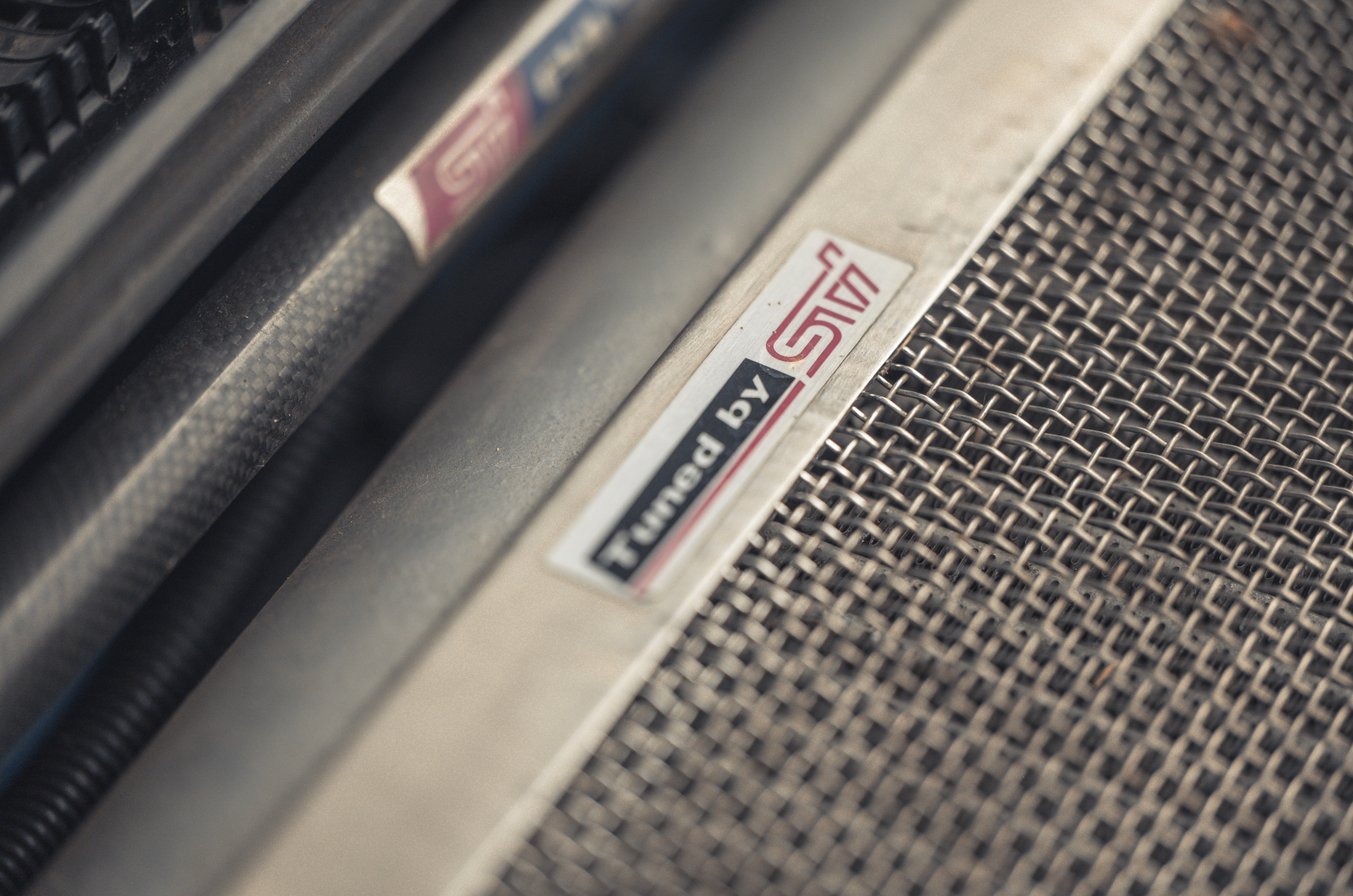 Classic & Sports Car - Black & Blue: Ford Escort RS Cosworth vs Subaru Impreza P1