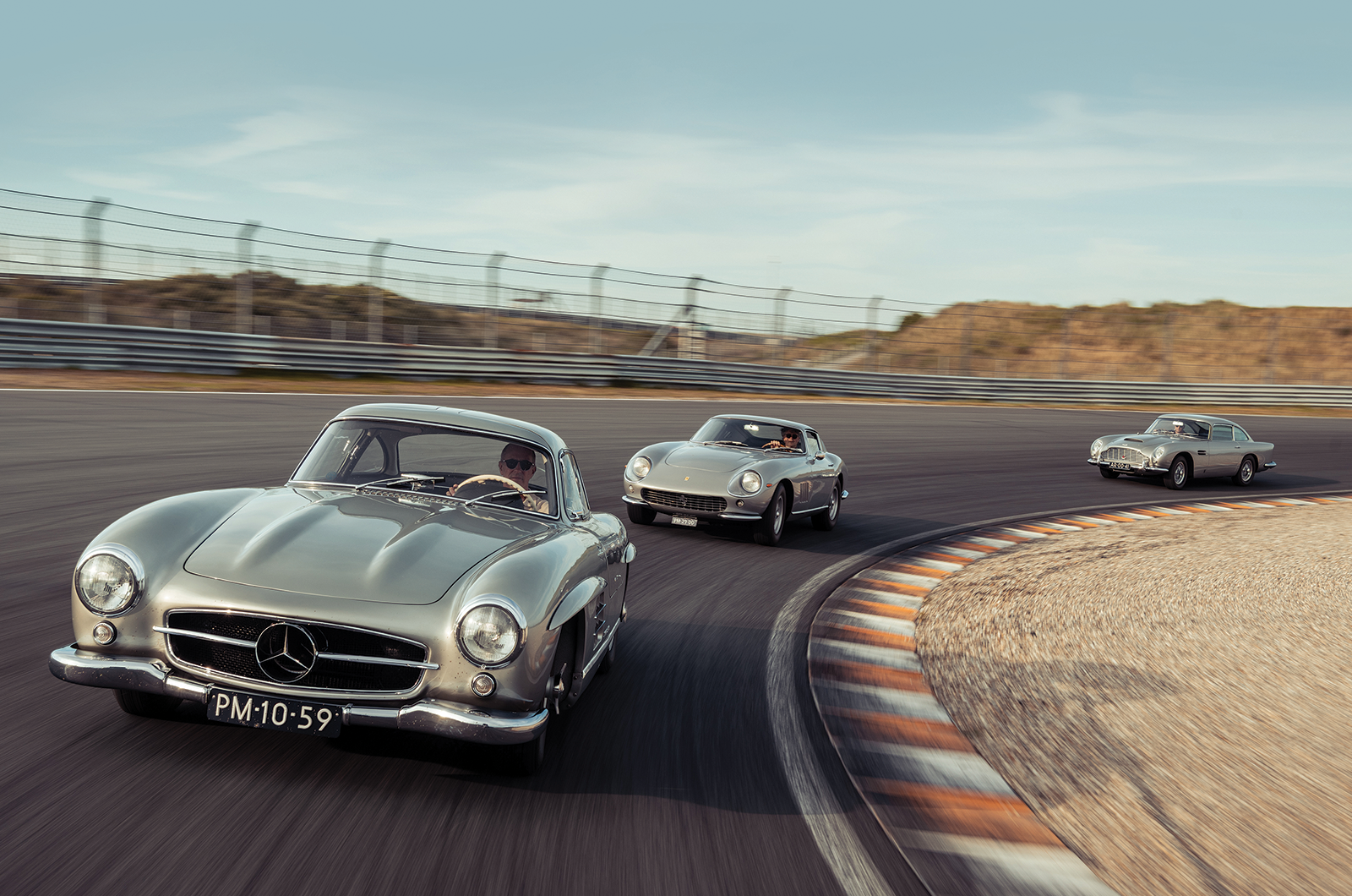 Classic & Sports Car – Aston Martin DB5 vs Mercedes-Benz 300SL vs Ferrari 275GTB: million dollar babies