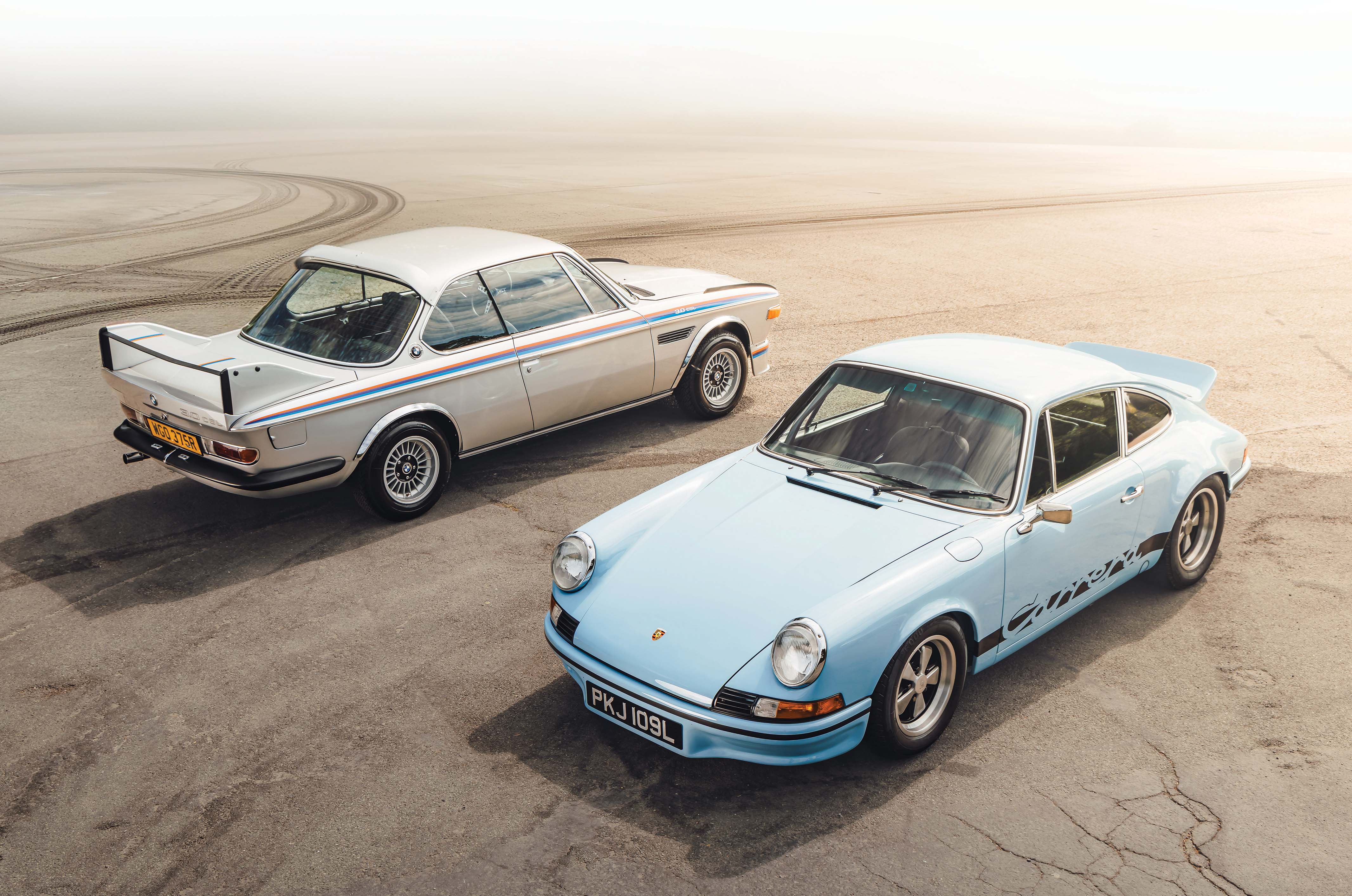 Classic & Sports Car – BMW 3.0 CSL ‘Batmobile’ vs Porsche 911 Carrera RS 2.7: the speed of light