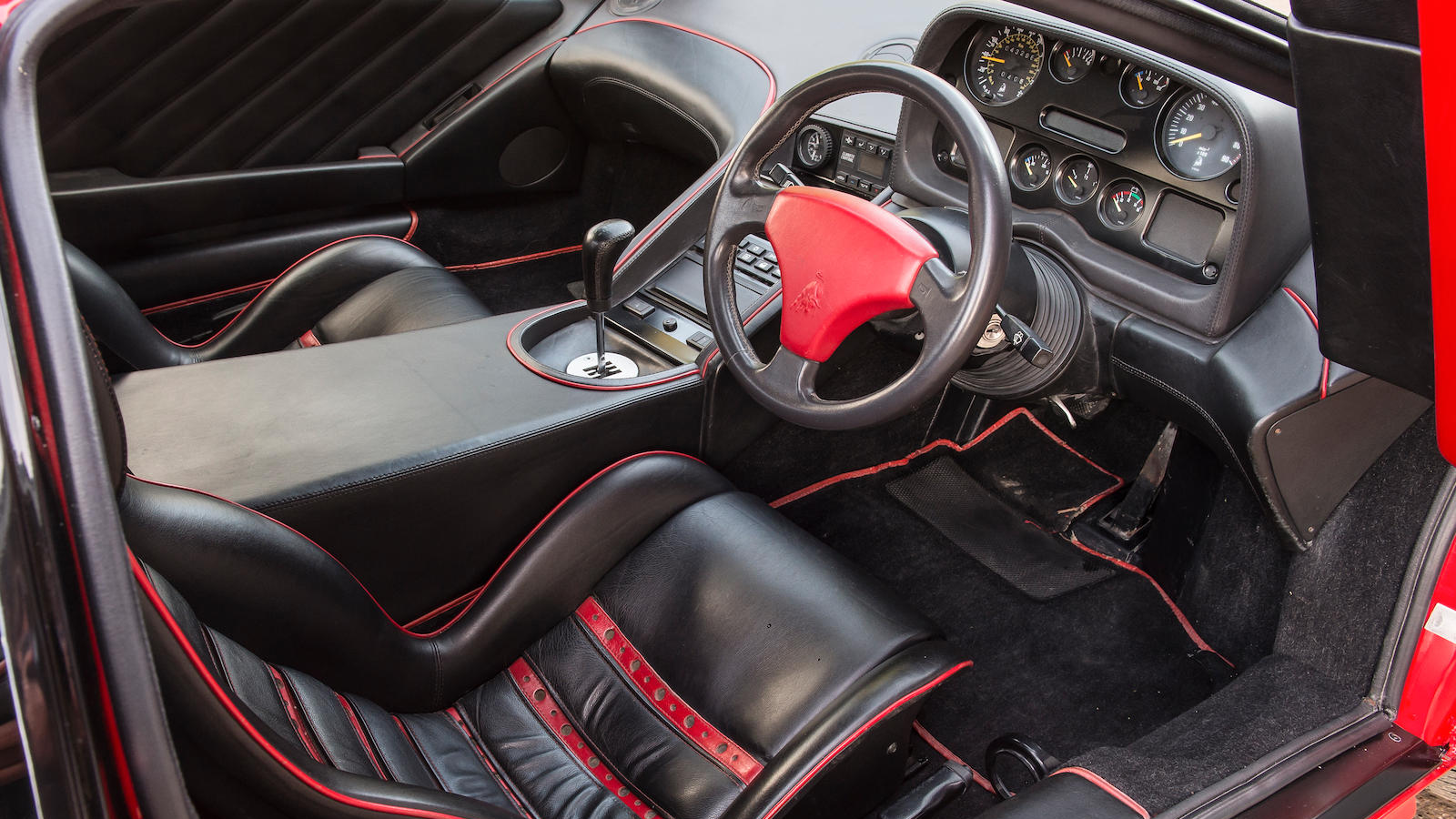 Rock legends' supercars up for auction