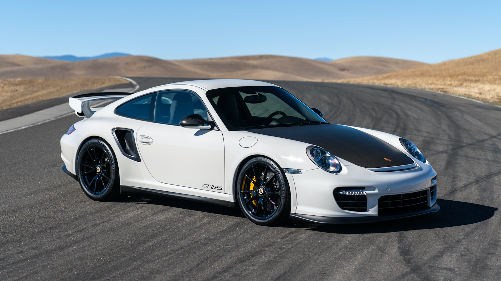 WhatsApp founder to auction 10 of his Porsches